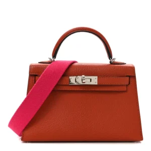 1:1 Hermès Replica – Mini Kelly 20 Chevre Cuivre Rose Mexico